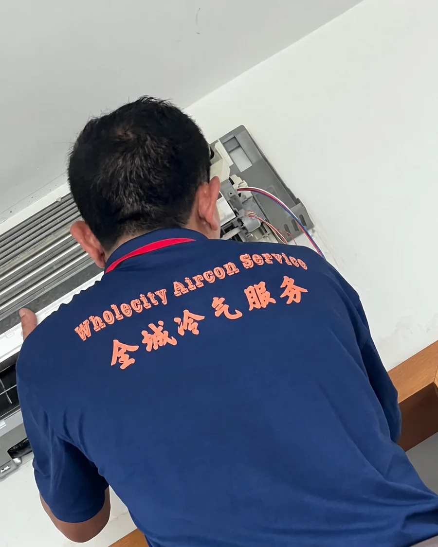 Servicing a wall-mounted aircon